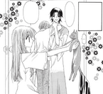 Yuki watches as Tohru holds Kyo.