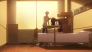 Haru tries to comfort Rin after she smashes the vase of flowers he brought her