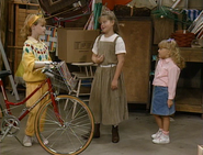 D.J., Kimmy, and Stephanie playing in the basement