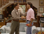 Shaking hands with Jesse in "Radio Days" (1992)