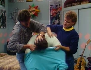 Danny and Joey help Jesse get dressed