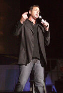 Saget performing stand-up in 2007