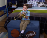 Max, practicing the trombone