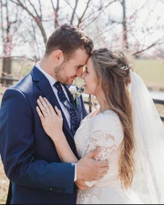 Jed and Katey touching foreheads on their wedding day