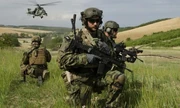 Czech forces patrolling Slovak countryside.