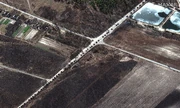 Satellite image depicting trucks in a massive line north of Kyiv