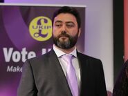 Prime Minister Carl Benjamin