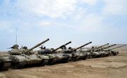 Azerbaijani tanks line up for military drills