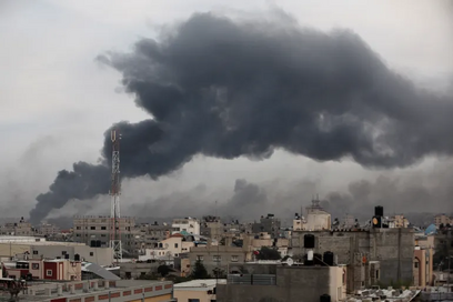 Smoke emits from buildings in Gaza following intense Israeli air strikes.
