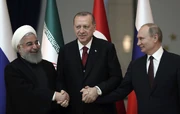 Erdogan meeting with Vladimir Putin (Right) and Hassan Rouhani (Left) in a conference