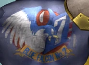 Blue Falcon logo seen on the back of Captain Falcon.