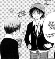 Tsubasa giving Natsume his birthday present.