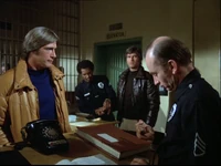 Galactica Discovers Earth - Police station 1.png (588 KB) Troy and Dillon being processed