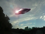 The Grey ship landing on Earth.