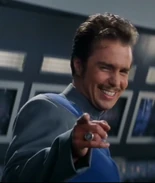 Roc Ingersol / Guy Fleegman portrayed by Sam Rockwell