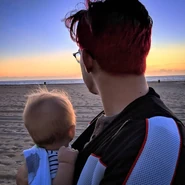 Ollie and his dad on the beach