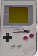 A Game Boy with the Santa Clara Divison logo on it