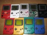 Dmgcollection.jpg (1.87 MB) An off-white Game Boy DMG, seven basic Play it Loud! Series Game Boy color variations, and a rare red with Manchester United Logo on the shell