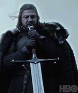 Eddard preparing to wield the greatsword Ice.
