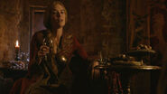 Cersei, with wine glass