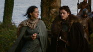 Talisa and Robb Stark talking a walk near a riverbank on their way back from the Crag in "The Prince of Winterfell."