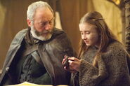 Davos with Shireen Baratheon in "The Dance of Dragons"
