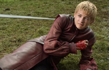 Joffrey cowers as Arya holds his sword "Lion's Tooth" in "The Kingsroad."