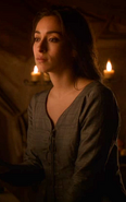 Talisa sitting beside Robb in "The Prince of Winterfell."