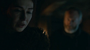 Melisandre confides with Davos.