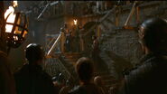 Podrick watches as Tyrion rallies the King's Landing defenders in "Blackwater".