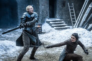 Arya has a playful sword battle with Brienne of Tarth in Season 8