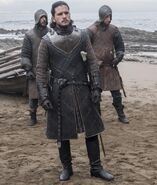 Jon Snow escorted by Northener Stark soldiers at Dragonstone ("The Queen's Justice").