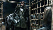 Robb Stark threatens Jaime with Grey Wind.