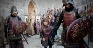 Lannister soldiers flanking Tyrion.