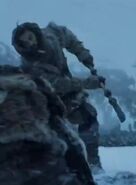 A wildling with a dragonglass spear