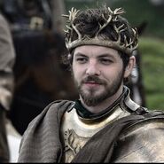 Renly wears more ornate armor after declaring himself king