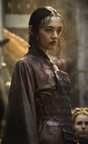 A , apparently of ethnic Yi Tish origin, seen preaching in the streets of  in Season 5's "".