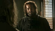 Yoren gives news of the arrest of Tyrion Lannister to the Hand of the King.