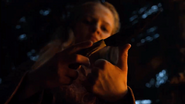 Young Cersei cuts her finger to draw a drop of blood, which Maggy the witch uses to tell her future