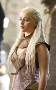 Daenerys's second experimental design in Qarth: she has switched out the metal filigree armor for leather armor, harking back to her original Dothraki style. Her experimental designs are also cut more like a male Qartheen tunic instead of a Qartheen woman's gown, because Daenerys wants to dress like those in power.