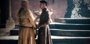 Littlefinger and Varys speak in "The Climb".