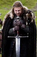 Eddard Stark, carrying his family's ancestral Valyrian steel sword, Ice.