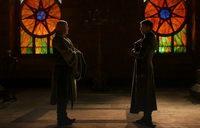 Varys and Petyr Baelish in the Iron Throne room.