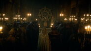 Roslin Frey (left) is walked down the aisle to be given away by her father, Walder Frey (right).
