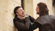 Ned threatening Petyr in "Lord Snow."