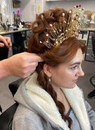 Emily Carey being made up in Alicent's wedding dress