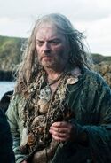 The Drowned Priest that blessed Theon: the Drowned Men wear tattered roughspun robes, decorating themselves only with whatever washes up from the sea.