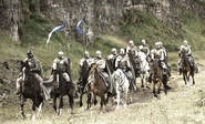 Knights flying the banner of House Arryn galloping through the Vale. Promotional image from "The Wolf and the Lion".