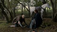 Brienne kneels