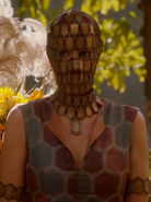 Quaithe, also from Asshai, has a stylistic link with Melisandre. Her dress also features a motif of repeating hexagons, and her elaborate face-mask consists of repeated elongated hexagons, just like Melisandre's necklace.